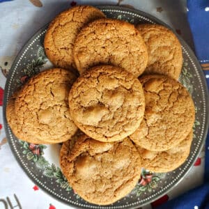 A plate with 8 ginger cookies.