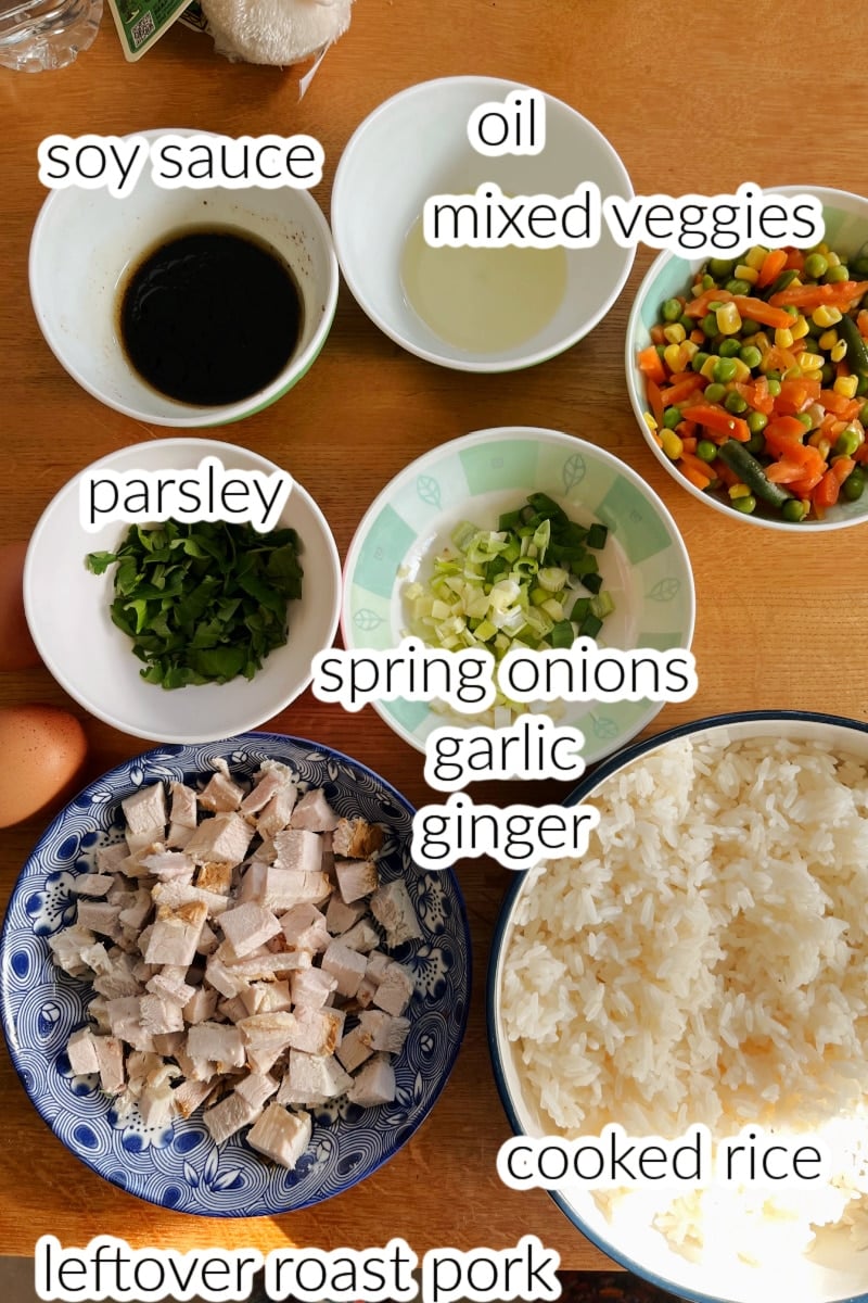Ingredients used to make egg fried rice with leftover pork.