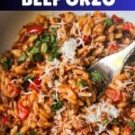 Ground beef orzo in a white bowl.