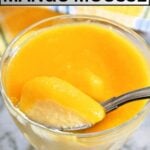 A glass with mango mousse.