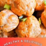 Salmon balls with chopped spring onions.