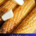 4 corns on the cob with 2 knobs of butter on top.