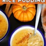 A white and blue ramekin with pumpkin rice pudding, a partially visible ramekin with more pudding, and a partially visible pumpkin.