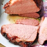 A sliced ham on a plate.