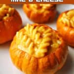 4 mini pumpkins stuffed with pumpkin pasta.