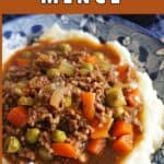 Mince and gravy with veggies over a bed of mash.