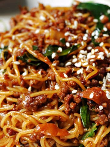 Close-up portion of ground beef and veggie stir fry noodles.