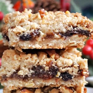 A stack of 3 mince pie crumble bars.