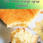 A forkful of sponge cake sitting on a plate with a slice of cake.