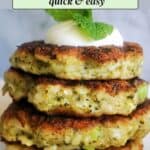 A stack of 4 patties topped with yogurt and mint leaves.