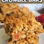A pile of 2 crumble bars on a white plate.