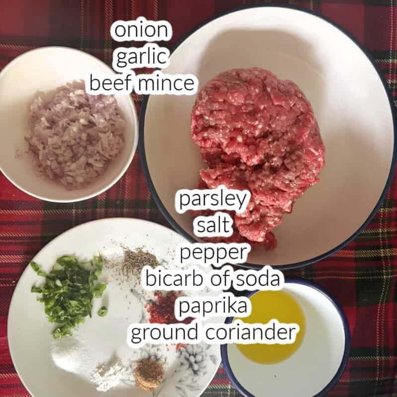 Ingredients displayed for making beef kofta kebabs.