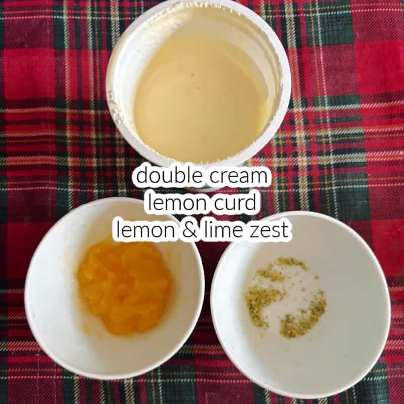 A white ramekin with cream, another one with lemon curd and a third one with lemon and lime zest.