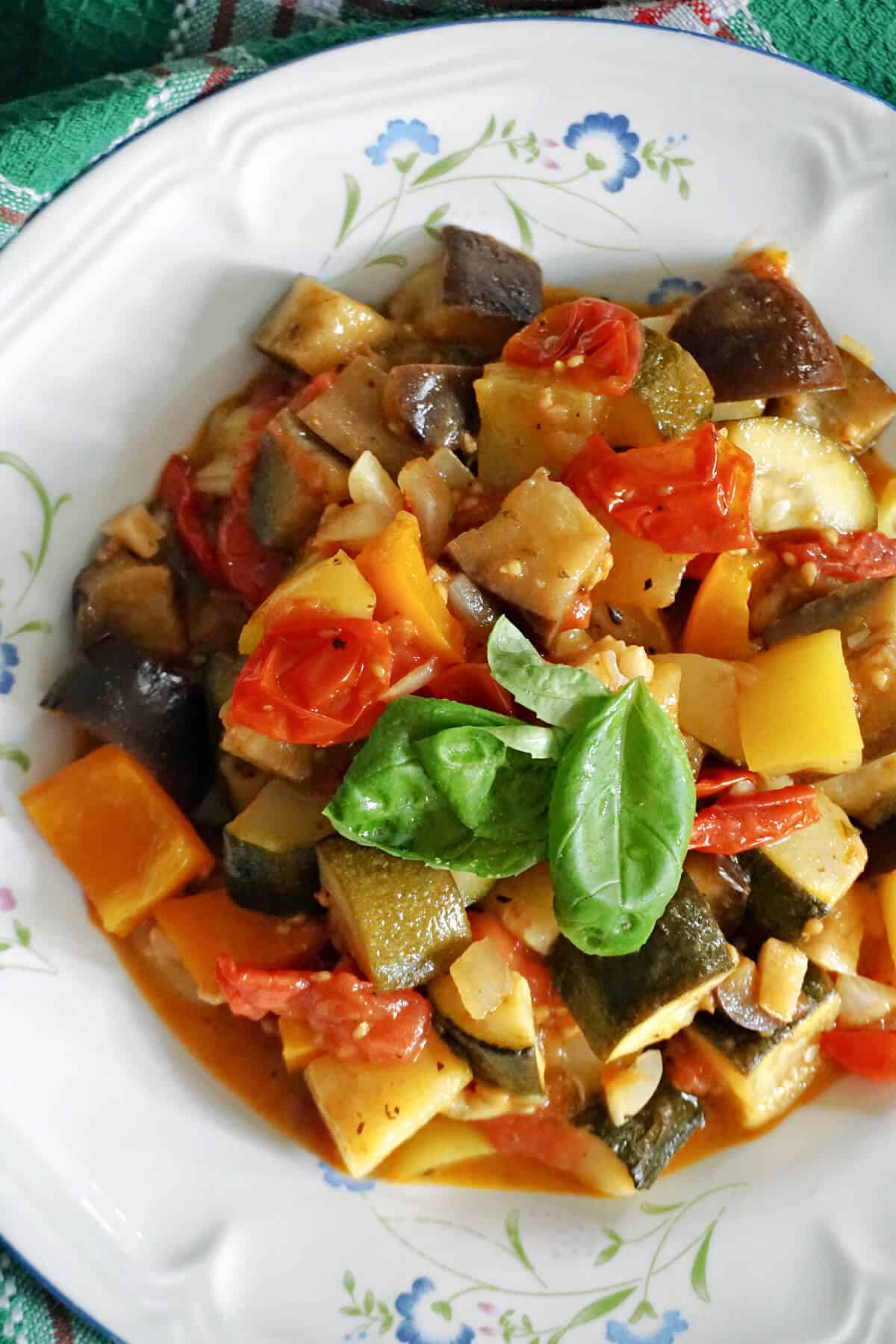 A plate with a portion of summer veggie stew.
