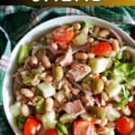 A white bowl with tuna and bean salad.