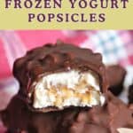 2 halves of a chocolate-covered popsicle.