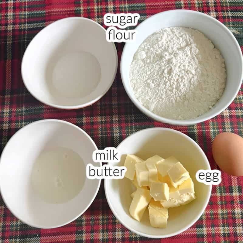 Ingredients displayed for making a sweet shortcrust pastry.