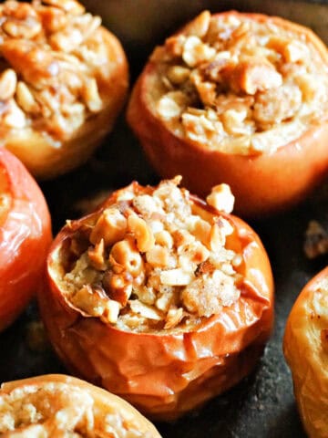 A tray with baked stuffed apples.