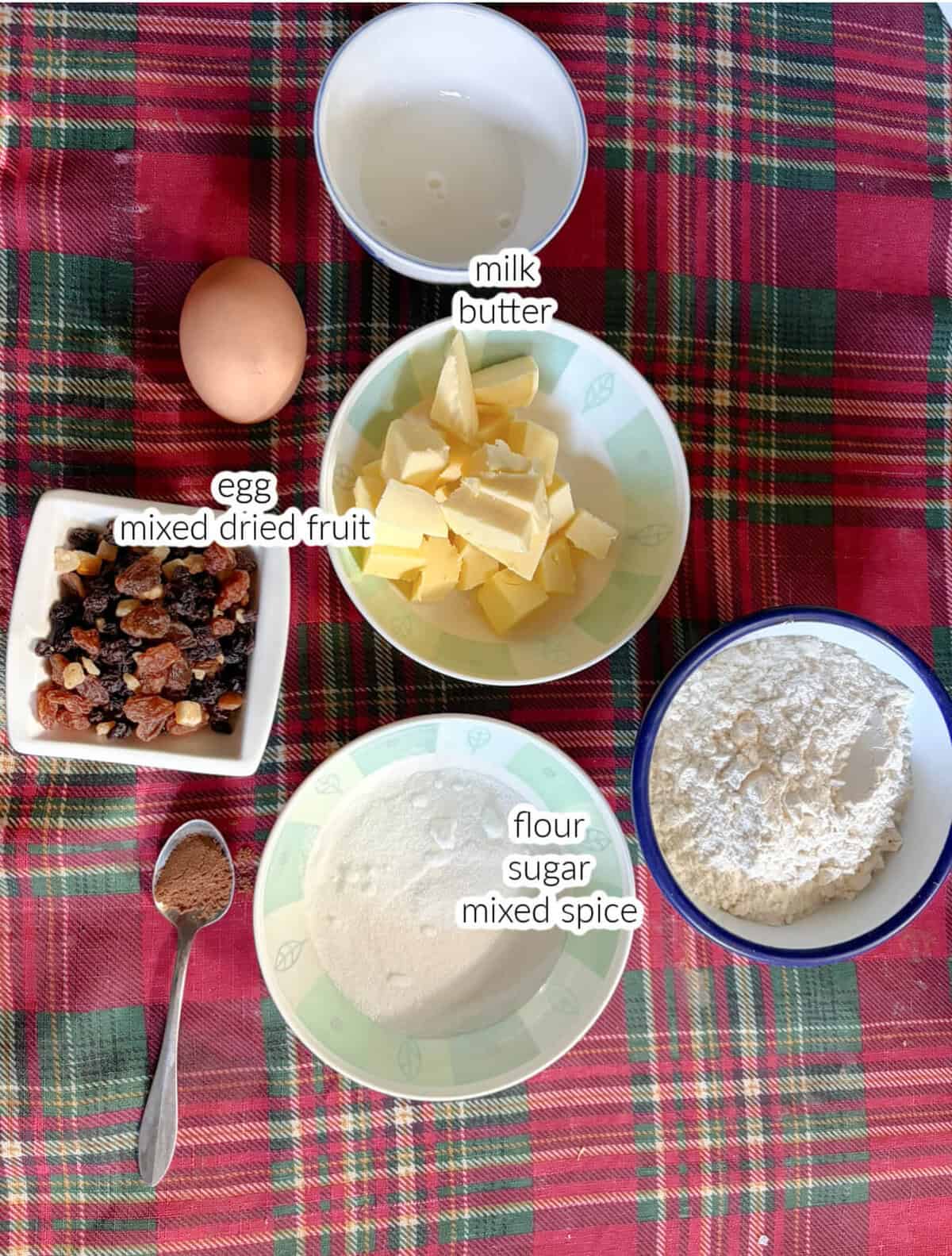 Ingredients displayed on a table for making Welsh cakes.