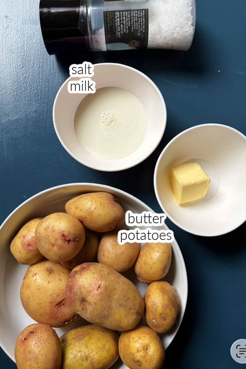 Ingredients displayed on the table for making mashed potatoes.
