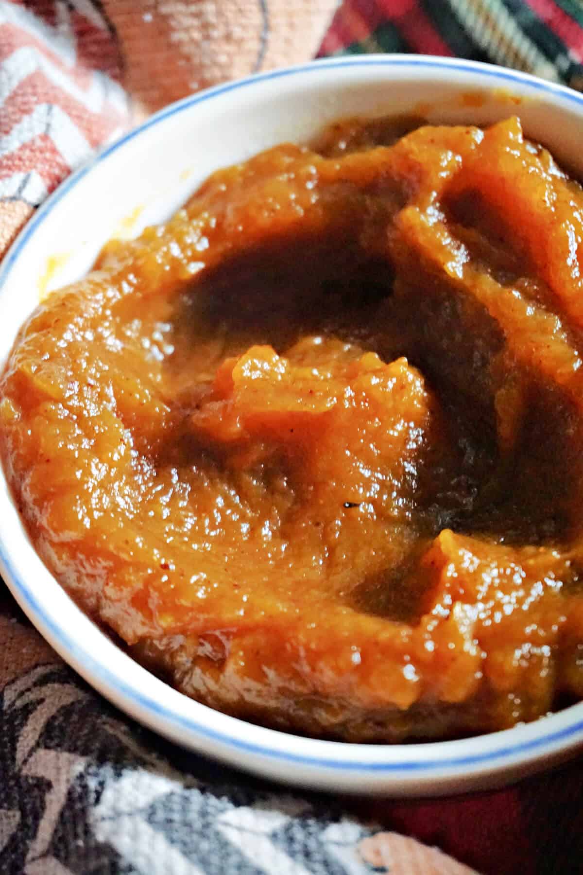A ramekin with pumpkin butter.